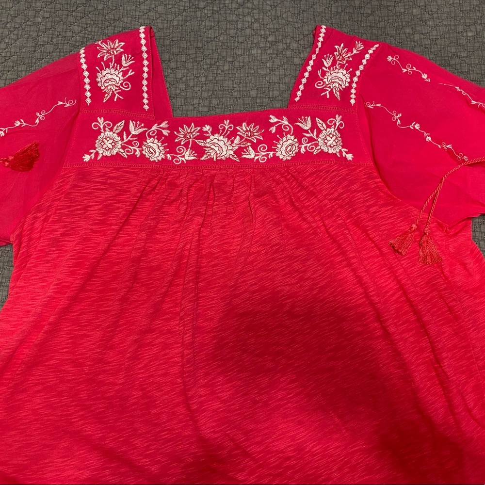 Embroidered peplum top